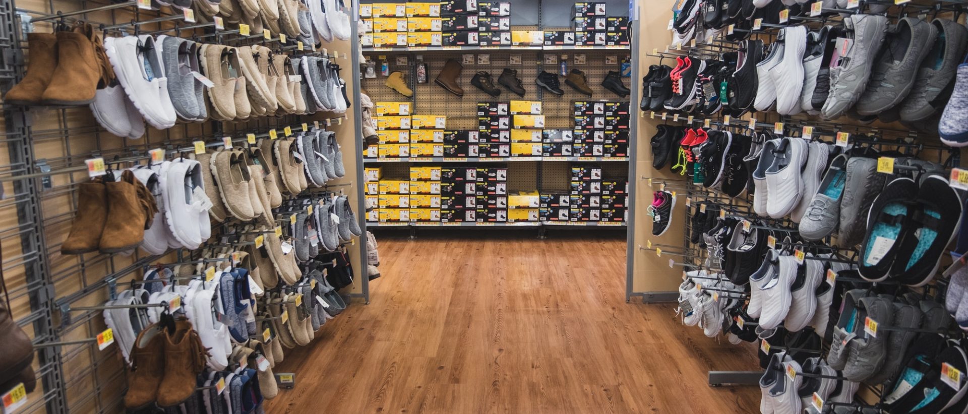 shoe-aisle-in-store-lots-of-shoes-on-racks.jpg